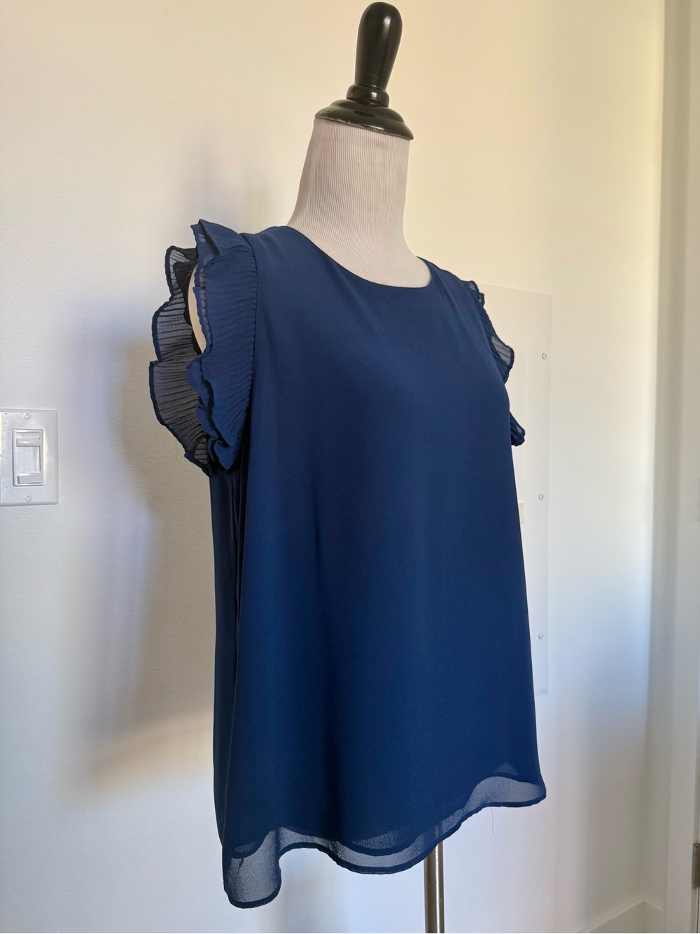 Naked Zebra Navy Ruffle Cap-Sleeve Blouse
